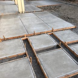 Finished concrete pads drying. Finished concrete pads drying.