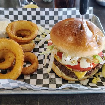 Chubby's Public House - Burger with onion rings again. - Burgers Near Me - Bryan, Texas