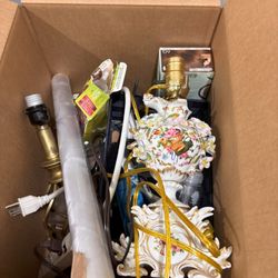 Zip Moving And Storage - antique lamp thrown into a box