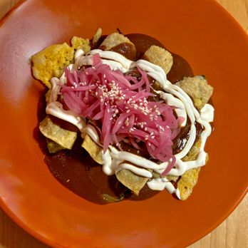 Mala Pata Molino + Cocina - Rajas Enchiladas - Fire-Roasted Poblanos, Queso Cotija, Cheerwine Mole, Pickled Onions, Sesame, Crema, White Corn Tortillas - Mexican Near Me - Raleigh, North Carolina Mala Pata Molino + Cocina - Rajas Enchiladas - Fire-Roasted Poblanos, Queso Cotija, Cheerwine Mole, Pickled Onions, Sesame, Crema, White Corn Tortillas - Mexican Near Me - Raleigh, North Carolina