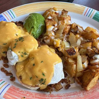 Squeeze In - Chipotle Benny. Supposed to be the hottest Benny on the block. 3 eggs on top of chorizo over the English muffin halves. - American Near Me - Las Vegas, Nevada Squeeze In - Chipotle Benny. Supposed to be the hottest Benny on the block. 3 eggs on top of chorizo over the English muffin halves. - American Near Me - Las Vegas, Nevada