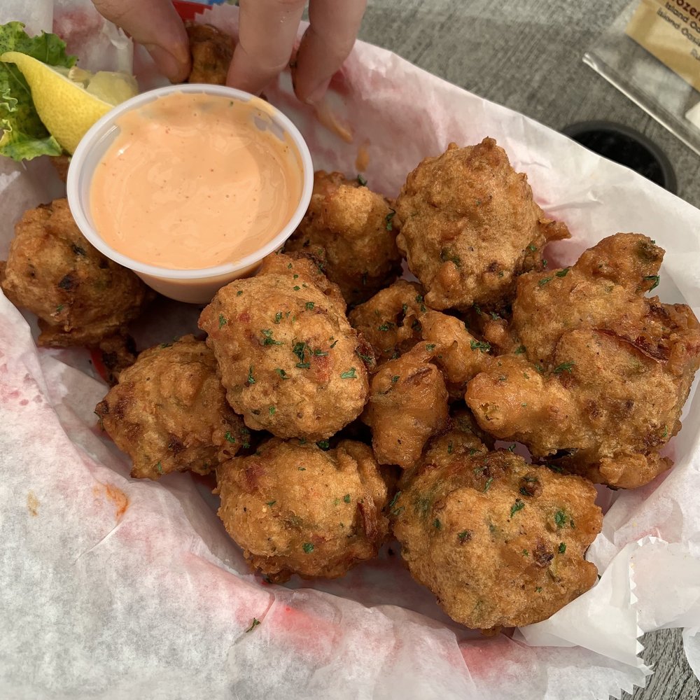 Squid Lips - Conch Fritters - Seafood Near Me - Cocoa Beach, Florida Squid Lips - Conch Fritters - Seafood Near Me - Cocoa Beach, Florida
