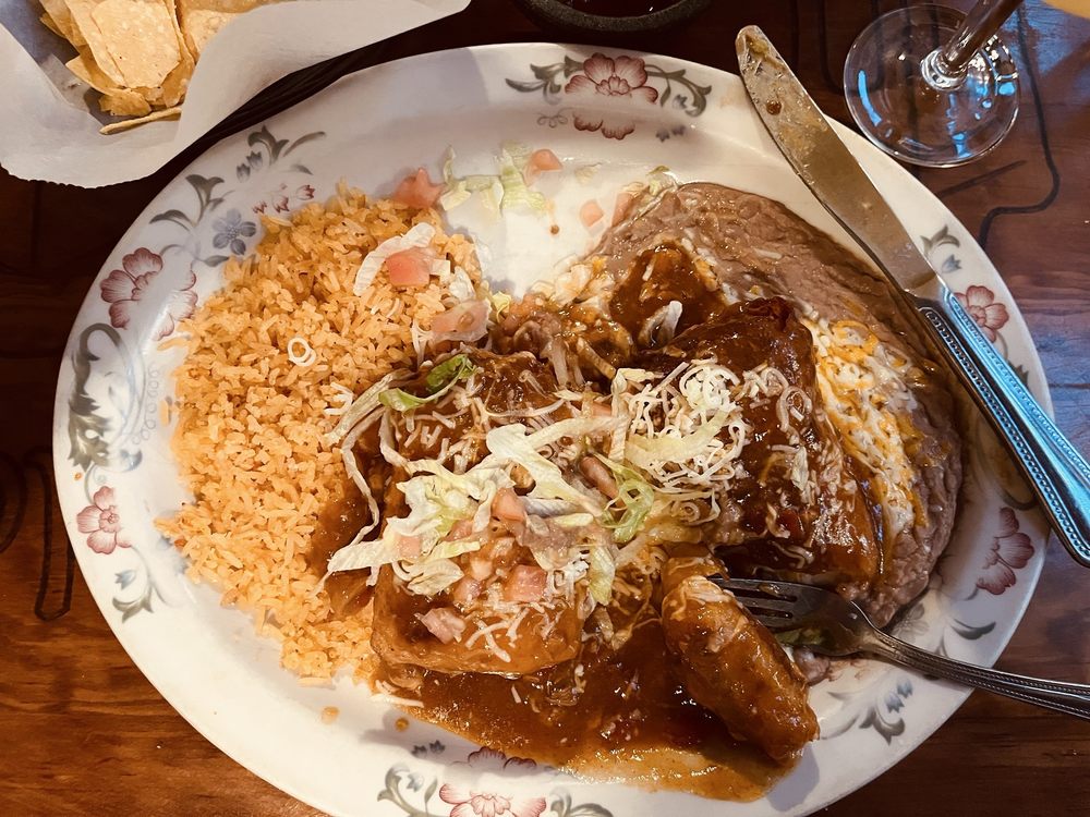 Sizzling molcajete bowl of Mexican food at Pueblo Viejo Restaurant in Colorado Springs