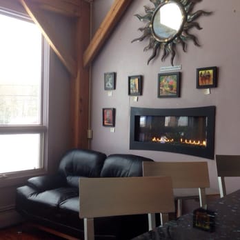 Liquid Art Restaurant - Lovey fireplace and nice view of the snow falling. - Coffee & Tea Near Me - Killington, Vermont