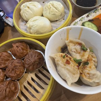 Dillon's Dumpling House - 8. Garlic Xiao Long Bao Pork Dumpling in Chili Sauce Cucumber salad Bbq pork bun - Dim Sum Near Me - Aurora, Colorado Dillon's Dumpling House - 8. Garlic Xiao Long Bao Pork Dumpling in Chili Sauce Cucumber salad Bbq pork bun - Dim Sum Near Me - Aurora, Colorado