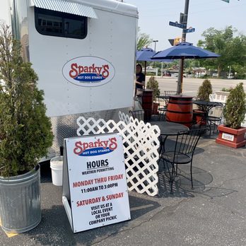 Sparkie's Hotdogs - Food Truck with a patio seating area - Food Stands Near Me Sparkie's Hotdogs - Food Truck with a patio seating area - Food Stands Near Me