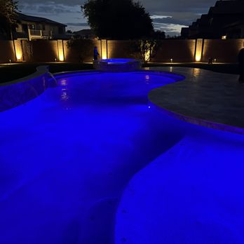 Arizona Rainfall - a pool lit up at night - Landscaping Near Me - Surprise, Arizona Arizona Rainfall - a pool lit up at night - Landscaping Near Me - Surprise, Arizona