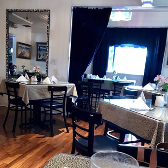 Pelican Cafe - Another view of one of the dining rooms. There are at least three but outside seating. - American Near Me - Lake Park, Florida