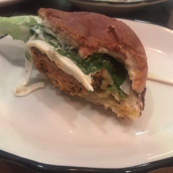The Whitlock - Half of the chorizo and shrimp burger with a bite in it - Bars Near Me - Katonah, New York The Whitlock - Half of the chorizo and shrimp burger with a bite in it - Bars Near Me - Katonah, New York