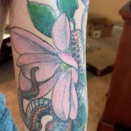 Snake and magnolia tattoo Snake and magnolia tattoo