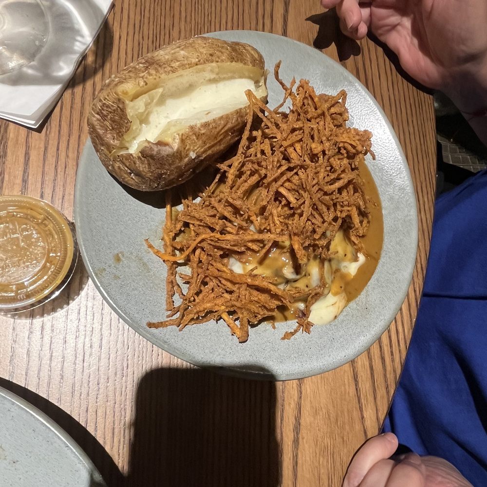 Outback Steakhouse - New Filet* Sheila with a baked potato - Steakhouses Near Me - Miami, Florida Outback Steakhouse - New Filet* Sheila with a baked potato - Steakhouses Near Me - Miami, Florida