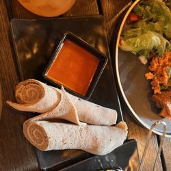 Ras Plant Based - injera with tasty hot source on the side - Awaze (Hot Sauce)