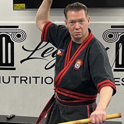 Relentless Current Defensive Arts - Double stick ready position