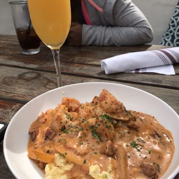 Edgar's Grille - Shellfish and grits with a mimosa. - New American Near Me - Augusta, Georgia Edgar's Grille - Shellfish and grits with a mimosa. - New American Near Me - Augusta, Georgia
