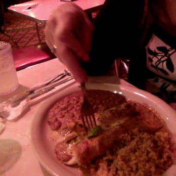 Chuy's - Enchilada. ..she couldn't wait haha - Mexican Near Me - Houston, Texas Chuy's - Enchilada. ..she couldn't wait haha - Mexican Near Me - Houston, Texas