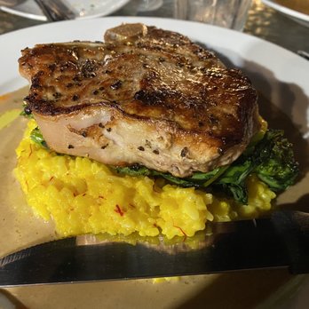 Cafe Amici - Veal Chop with saffron risotto and broccoli rabe with a brown sage butter sauce - Italian Near Me - Hamden, Connecticut