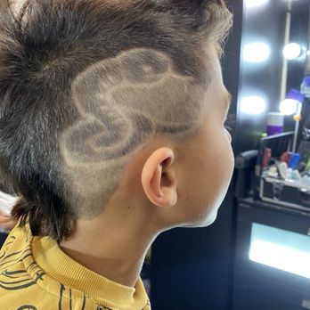 Fade Society - Coiled snake - Barbers Near Me Fade Society - Coiled snake - Barbers Near Me