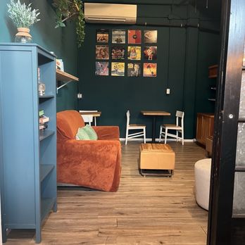 Rise & Grind Coffee - Indoor seating nook. - Coffee & Tea Near Me Rise & Grind Coffee - Indoor seating nook. - Coffee & Tea Near Me