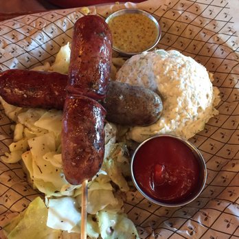 Blatt Beer & Table - 4 different types of sausages, braised kraut, and dill potato salad - Gastropubs Near Me - Omaha, Nebraska