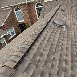 Roof Shark - Newly replaced ridge vent along with power attic fan.