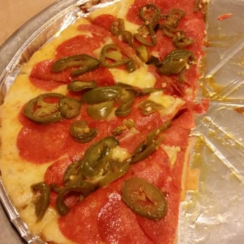 Pappy’s Pizzeria - Half of our gluten free pepperoni and jalapeño pizza. Not that great. - Pizza Near Me - Redmond, Oregon