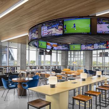 Nest On Four - Nest on Four's Halo of TVs, a nod to the large halo screen inside Mercedes-Benz Stadium. - Sports Bars Near Me - Atlanta, Georgia Nest On Four - Nest on Four's Halo of TVs, a nod to the large halo screen inside Mercedes-Benz Stadium. - Sports Bars Near Me - Atlanta, Georgia