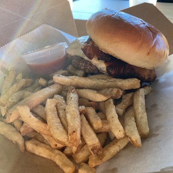 Consume - Grass-Fed Beef, Topped with Chihuahua Cheese, Ancho BBQ Sauce, Slow Roasted Pork Belly, Pineapple Salsa on a Brioche Bun - Cocktail Bars Near Me - Lake Zurich, Illinois Consume - Grass-Fed Beef, Topped with Chihuahua Cheese, Ancho BBQ Sauce, Slow Roasted Pork Belly, Pineapple Salsa on a Brioche Bun - Cocktail Bars Near Me - Lake Zurich, Illinois