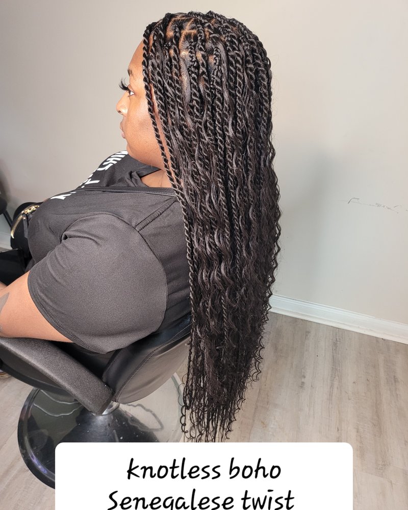 Vitine's Beauty Hair Braiding Logo