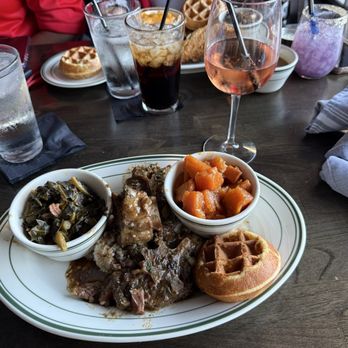Taste Kitchen Bar - Oxtails w/ rice & gravy, greens, candied yams, cornbread and peach moscato. - Breakfast & Brunch Near Me - Houston, Texas Taste Kitchen Bar - Oxtails w/ rice & gravy, greens, candied yams, cornbread and peach moscato. - Breakfast & Brunch Near Me - Houston, Texas