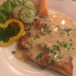 Weinstube Metzinger - The "klein" schnitzel with mushroom sauce - one portion included two plates of these!