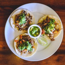 Local Jonny's Tavern & Café - Carnitas tacos with fresh tomatillo salsa