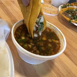 Guerito’s Red Tacos - Birria tacos dipped in consommé.