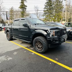 Scruggs Automotive Repair - 2020 Ford F150 leveled on Bilstein suspension sitting on 20" Fuel Rebels wrapped in LT305/55r20 Mickey Thompson Baja Boss A/T tires.
