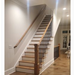 Lucky Savannah Vacation Rentals - Stairs in kitchen and living room leading to bedrooms. 70 yr olds struggling.