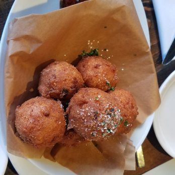 Plank Provisions - Hush puppies with jalapeno jam! Crisp on outside, fluffy on the inside, the jam pulled the flavors together. Highly recommend. - Seafood Near Me - Omaha, Nebraska Plank Provisions - Hush puppies with jalapeno jam! Crisp on outside, fluffy on the inside, the jam pulled the flavors together. Highly recommend. - Seafood Near Me - Omaha, Nebraska