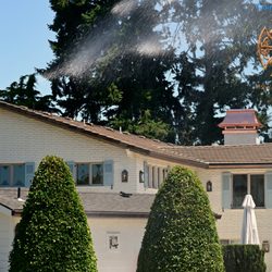 Bountiful Farms Nursery - A pair of new custom copper chimney caps on their home.
