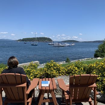 The Terrace Grille - Can't beat the view sitting on the adirondack chairs next to fire pit - Seafood Near Me - Bar Harbor, Maine The Terrace Grille - Can't beat the view sitting on the adirondack chairs next to fire pit - Seafood Near Me - Bar Harbor, Maine
