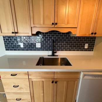 Master Landscaping & Tile - a kitchen with a sink and dishwasher - Landscaping Near Me Master Landscaping & Tile - a kitchen with a sink and dishwasher - Landscaping Near Me