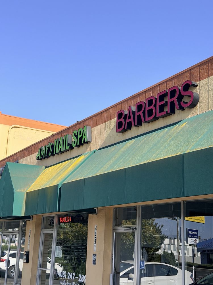 Saratoga Plaza Barber Shop Logo