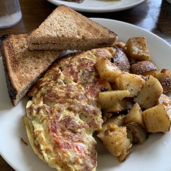 Avon Country Deli - Brown omelette and home fries which were more yellow than my eggs. - Delis Near Me - Avon, Connecticut Avon Country Deli - Brown omelette and home fries which were more yellow than my eggs. - Delis Near Me - Avon, Connecticut