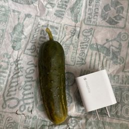 A small pickle for 4 dollars A small pickle for 4 dollars