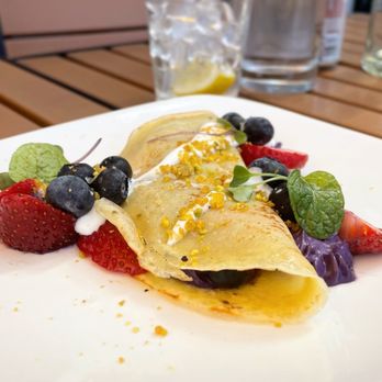 Derby - Purple Haze Crepe  ------------------ ube cream filling, berries, sour cream, pistachio pralines - Comfort Food Near Me - Seattle, Washington