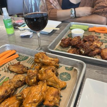 Two Tides Bar - Weekday special $14 wings and a beer or wine - Bars Near Me - Honolulu, Hawaii