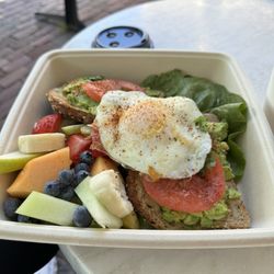 Chili lime avocado toast with egg and fresh fruit