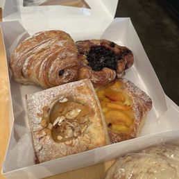 Chocolate Croissant, Puff Pastry With Pear, Peach pastry, and blueberry pastry Chocolate Croissant, Puff Pastry With Pear, Peach pastry, and blueberry pastry