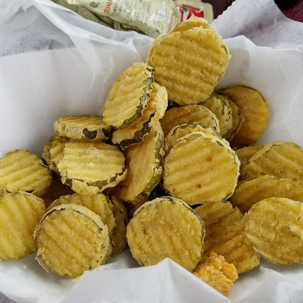 Flora-Bama Lounge, Package & Oyster Bar - Thick crispy fried pickles... served with ranch of course - Music Venues Near Me - Pensacola, Florida Flora-Bama Lounge, Package & Oyster Bar - Thick crispy fried pickles... served with ranch of course - Music Venues Near Me - Pensacola, Florida