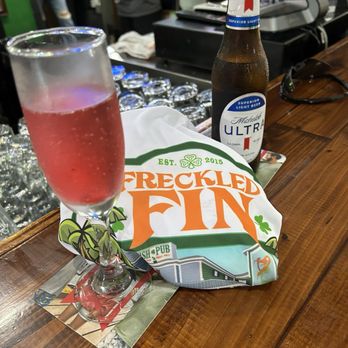 Freckled Fin Irish Pub - Mimosa and beer with purchased shirt. The second was Jell-O shots! Great time! - Irish Pub Near Me - Holmes Beach, Florida