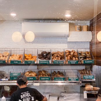 Bagel Pub - a man working behind the counter - Coffee & Tea Near Me - Brooklyn, New York Bagel Pub - a man working behind the counter - Coffee & Tea Near Me - Brooklyn, New York