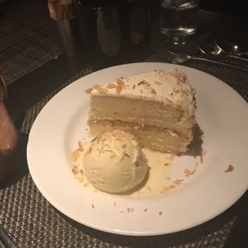 J Gilbert's - Seven layer coconut cake with pineapple ice cream - Steakhouses Near Me - McLean, Virginia