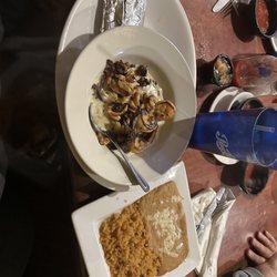 Los Arcos Mexican Food & Tequila Bar - This is the Tres Arcos Dip with a side of rice and beans.